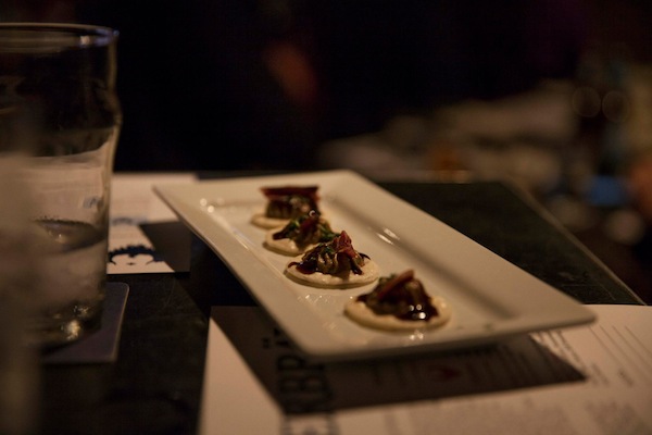 Foie Gras Small Bites (foie gras mousse, house-cured lamb bacon, soy-ginger glaze, curly parsley, Japanese rice cracker). 