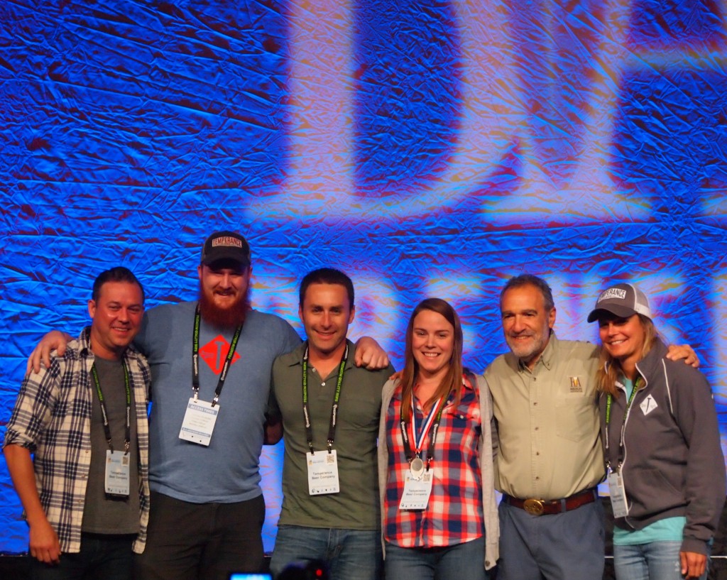 Temperance Brewing. Evanston's 1st craft brewery. Alex Lovinggood (hat), Josh Gilbert, Claudia Jendron take home Silver for English-Style IPA